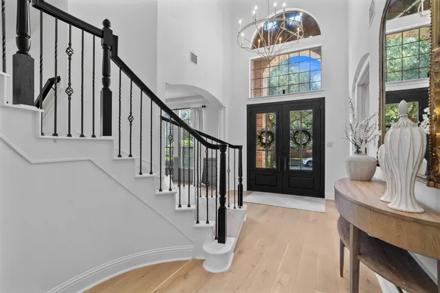 a view of entryway with wooden floor
