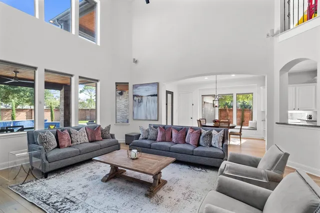 a view of kitchen with stainless steel appliances kitchen island sink refrigerator and stove