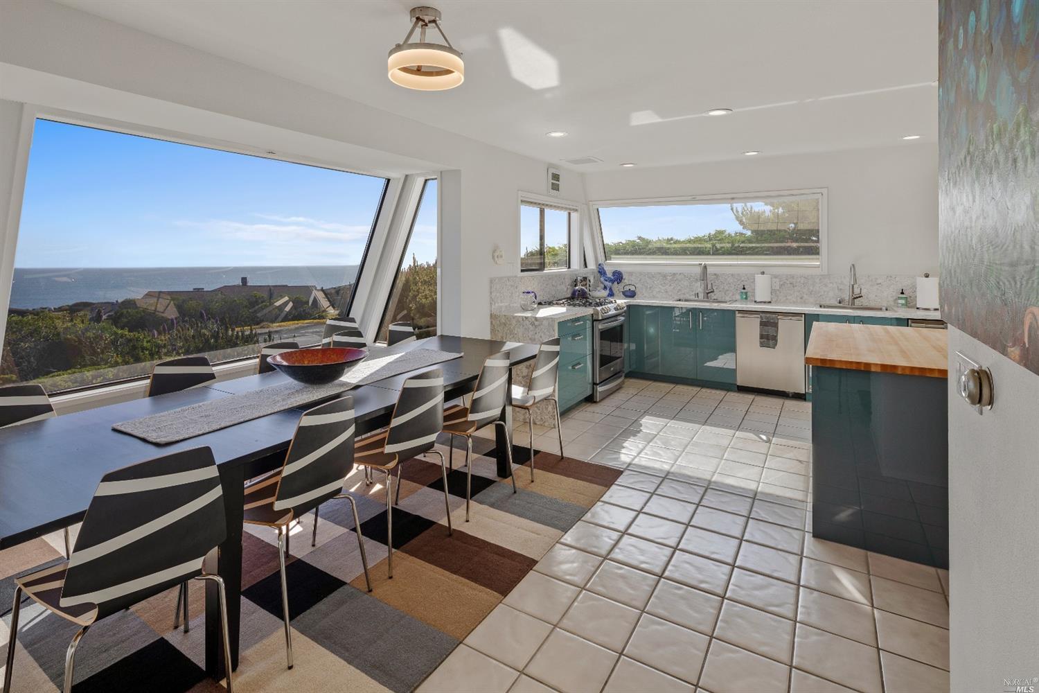 20455 Mockingbird Drive Bodega Bay, CA 94923 - Photo 1 of 1 a kitchen with a sink a counter top space and appliances