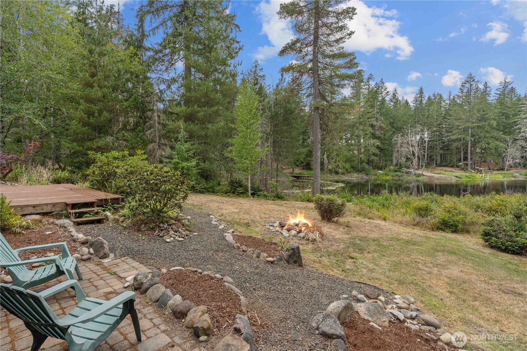 7131 Northeast Tahuya Blacksmith Road Belfair, WA 98528 - Photo 18 of 33 a view of a lake with houses