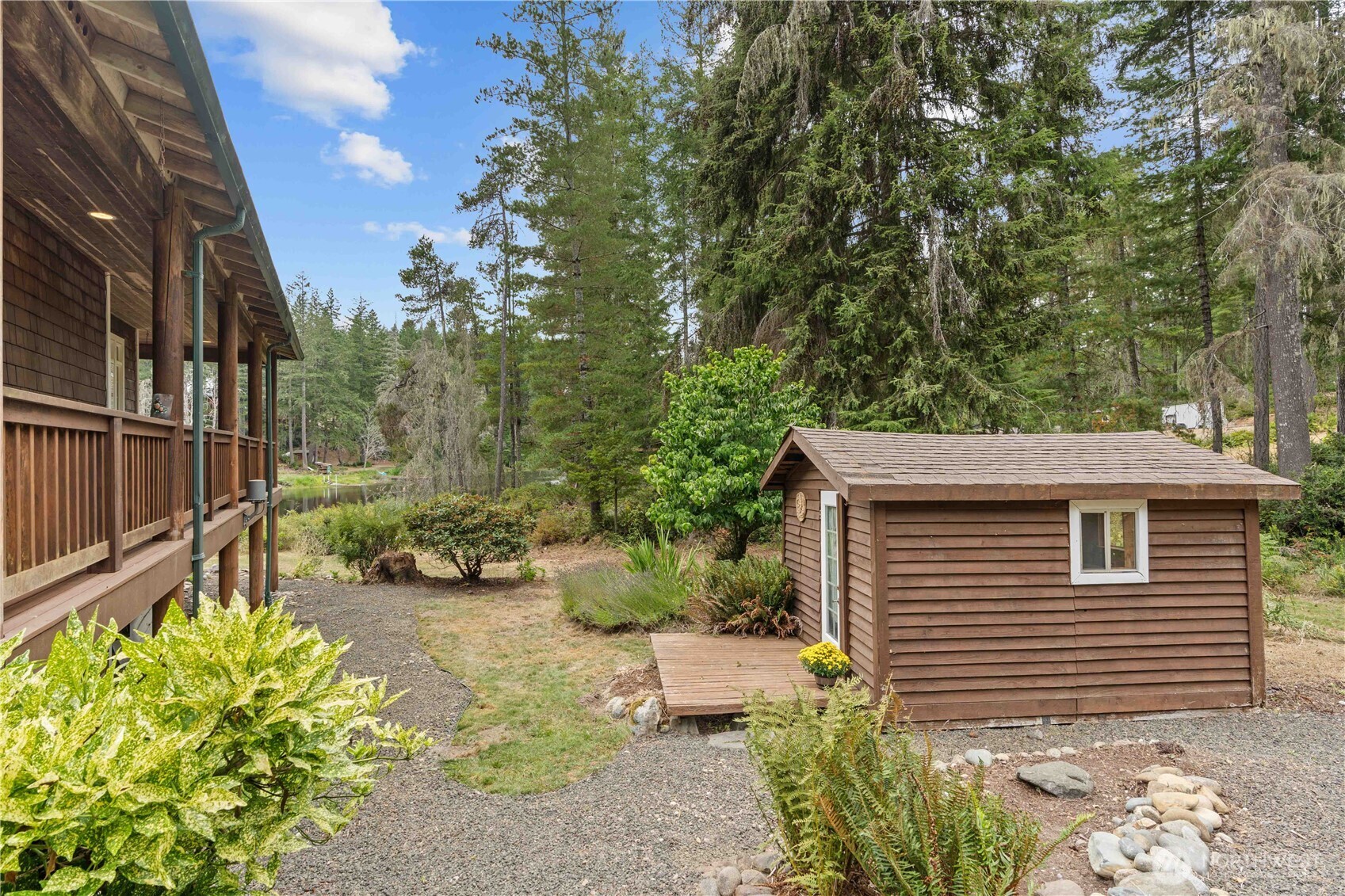 7131 Northeast Tahuya Blacksmith Road Belfair, WA 98528 - Photo 20 of 33 a view of a backyard with pathway