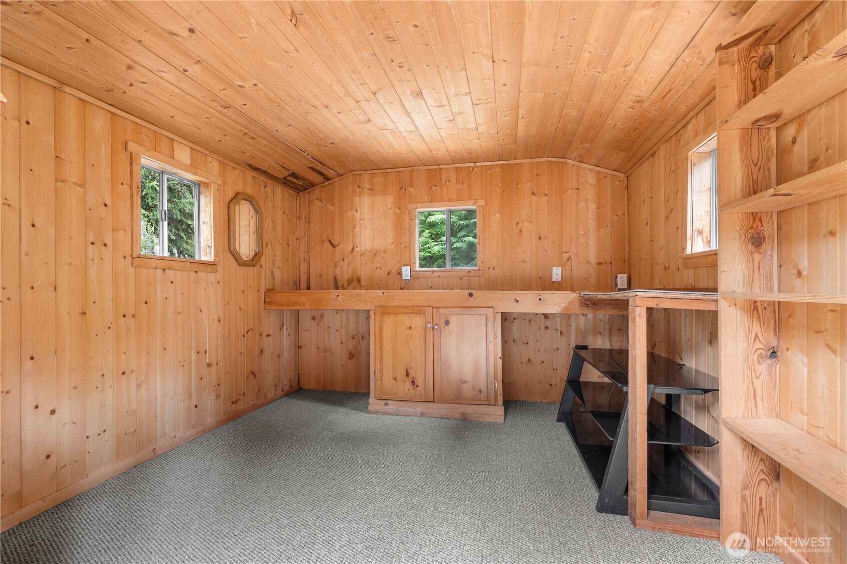 7131 Northeast Tahuya Blacksmith Road Belfair, WA 98528 - Photo 21 of 33 a kitchen with a sink and cabinets