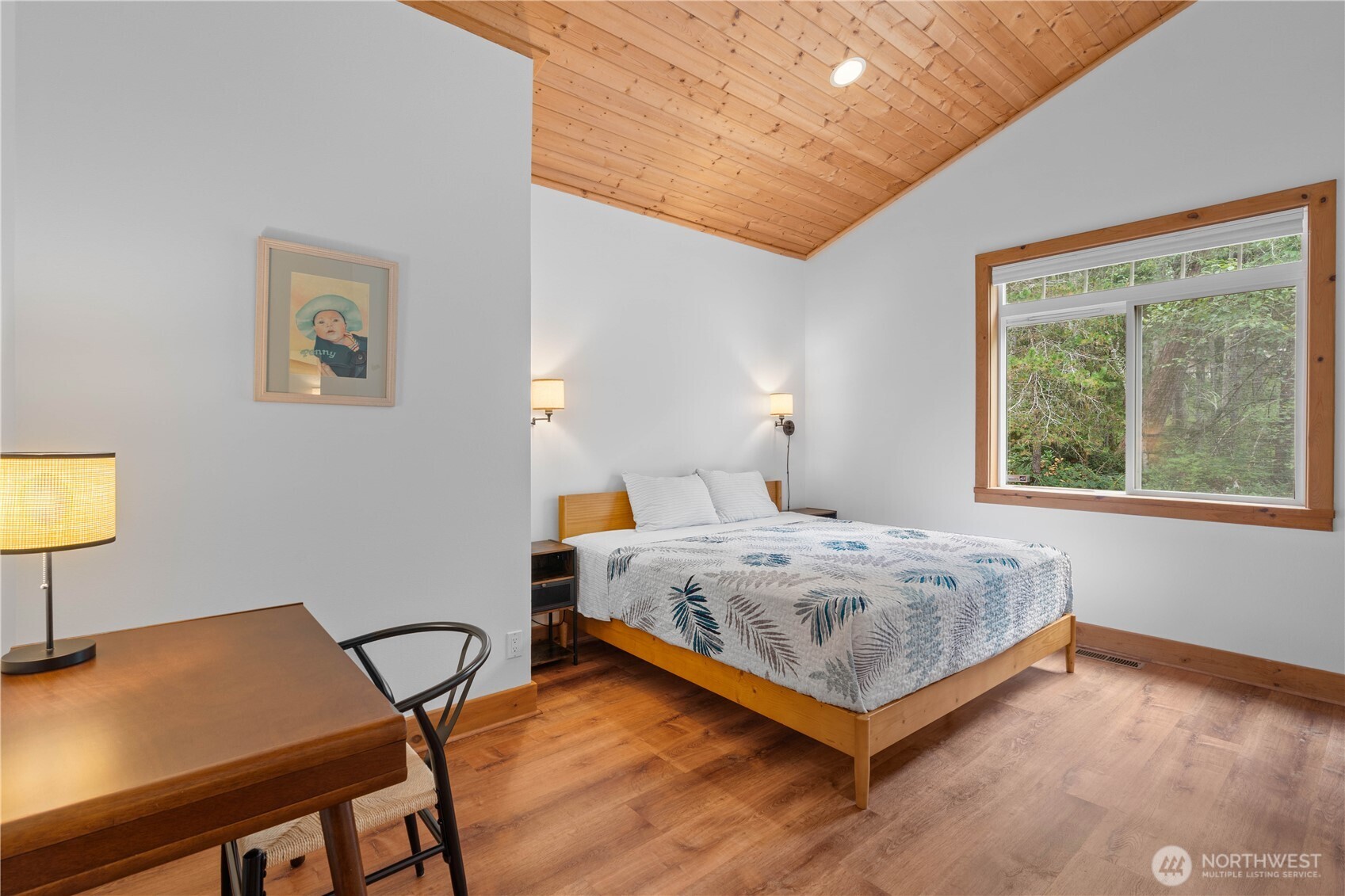 7131 Northeast Tahuya Blacksmith Road Belfair, WA 98528 - Photo 10 of 33 a bedroom with a bed and a desk