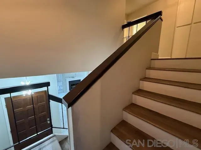 a bathroom with a shower and a sink