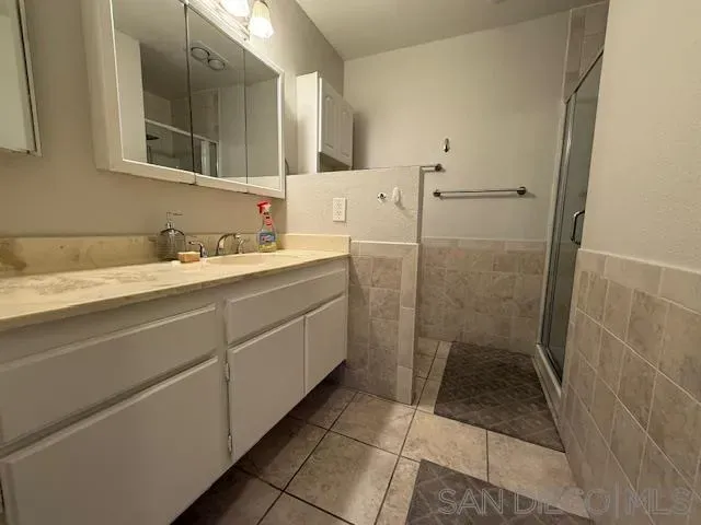 a view of a swimming pool with an outdoor seating