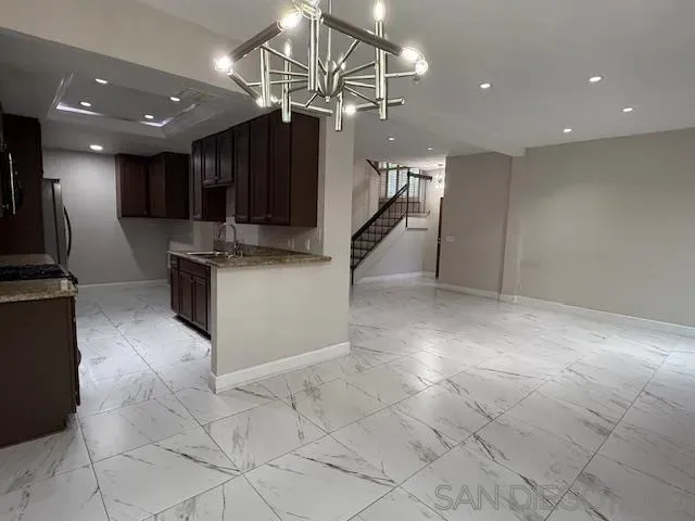 a view of kitchen and microwave