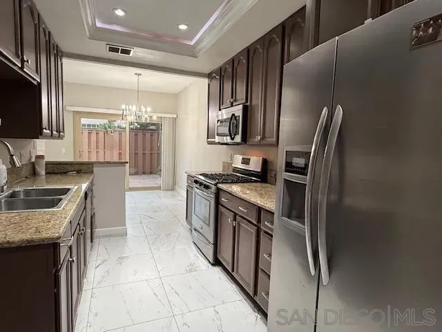 a view of a hallway view with staircase