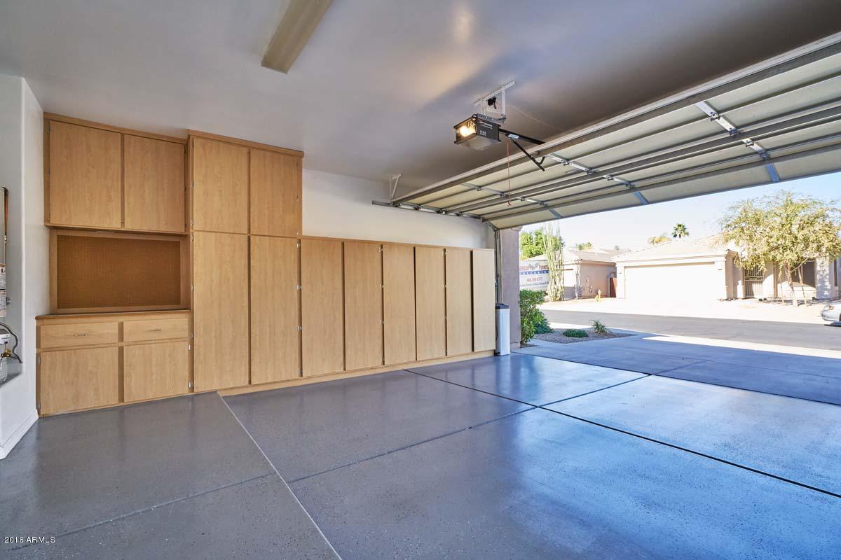 3135 East Amber Ridge Way Phoenix, AZ 85048 - Photo 33 of 41 Garage-Epoxy Floor and Cabinets