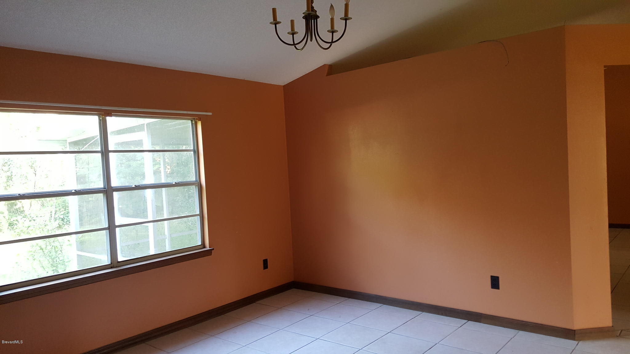 7175 Camilo Road Cocoa, FL 32927 - Photo 3 of 12 a view of a room with a window