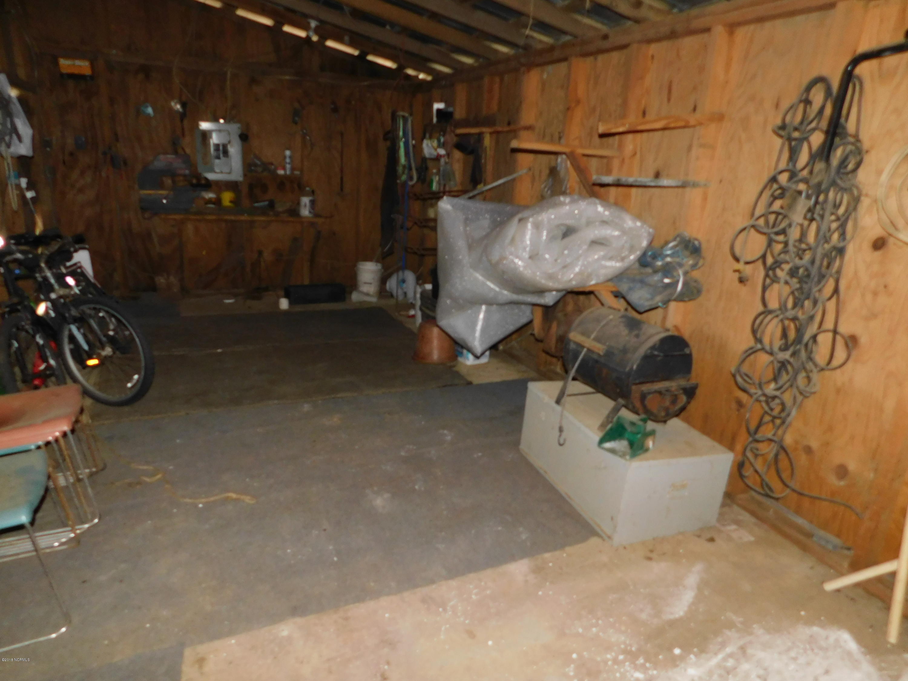 672 Roberts Road Newport, NC 28570 - Photo 34 of 36 Tack room/feed room