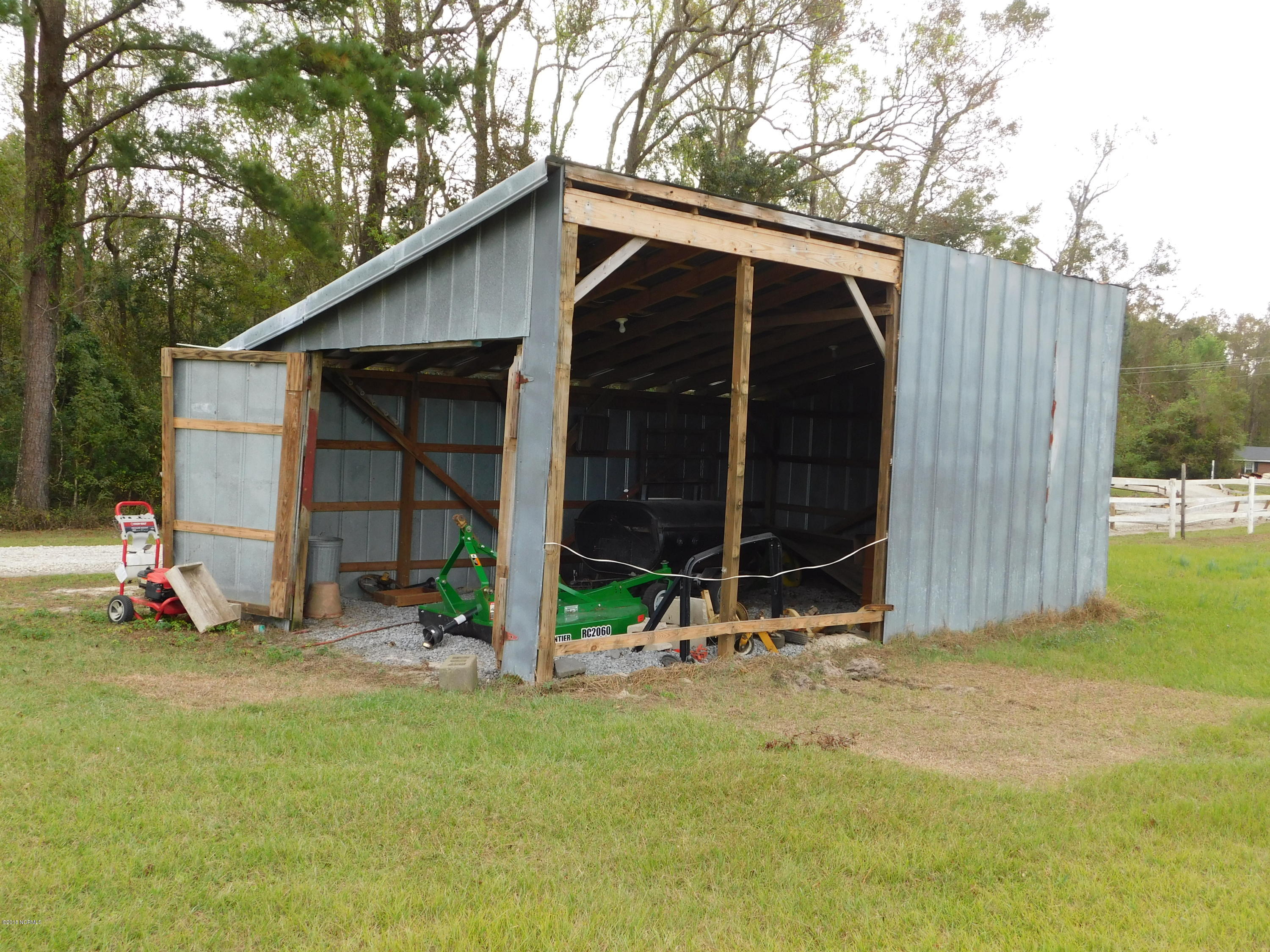 672 Roberts Road Newport, NC 28570 - Photo 36 of 36 Storage shed w/elec