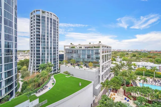 a view of a city with tall buildings