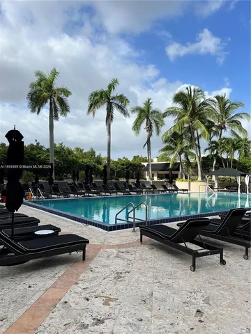 a bench sitting in the middle of a park