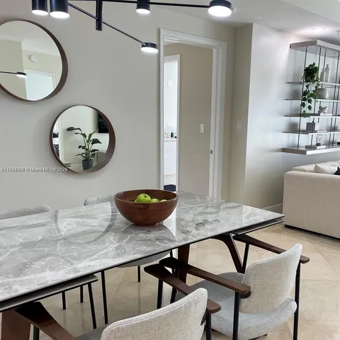 a view of a dining room and furniture