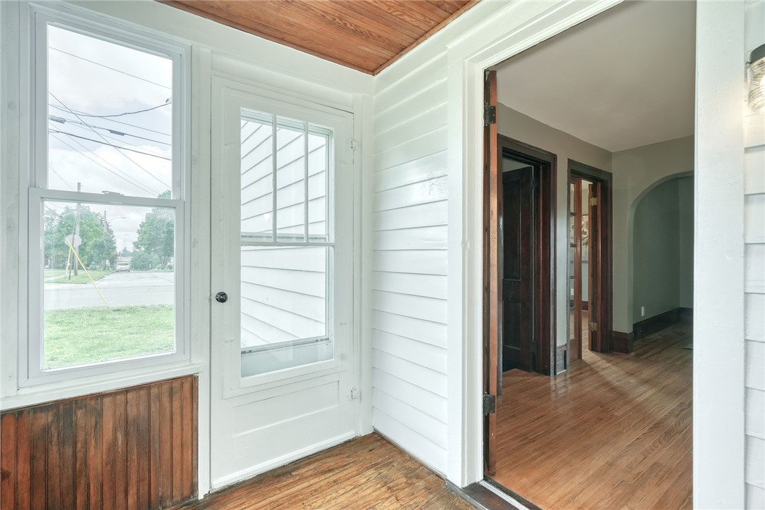 12 Handley Street Perry, NY 14530 - Photo 10 of 41 First Floor - Enclosed Porch (view 1-of-2)