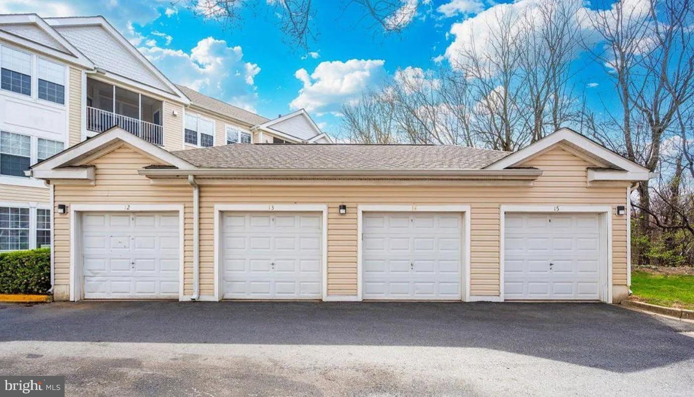 12012 Amber Ridge Circle, Unit B103 Germantown, MD 20876 - Photo 39 of 39 Charming garage with ample space.