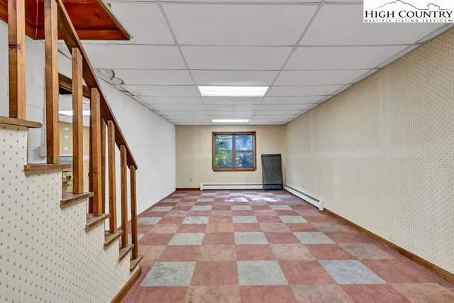 an empty room with closet area