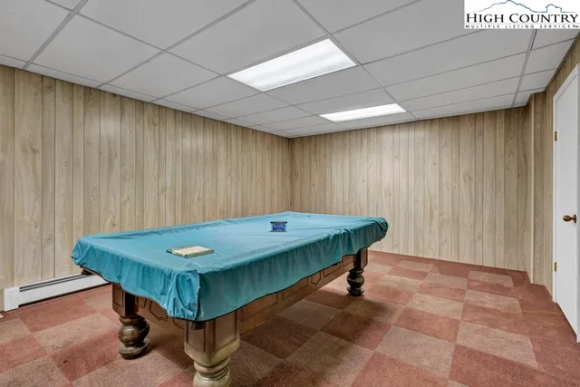 a view of a wooden door and an outdoor space