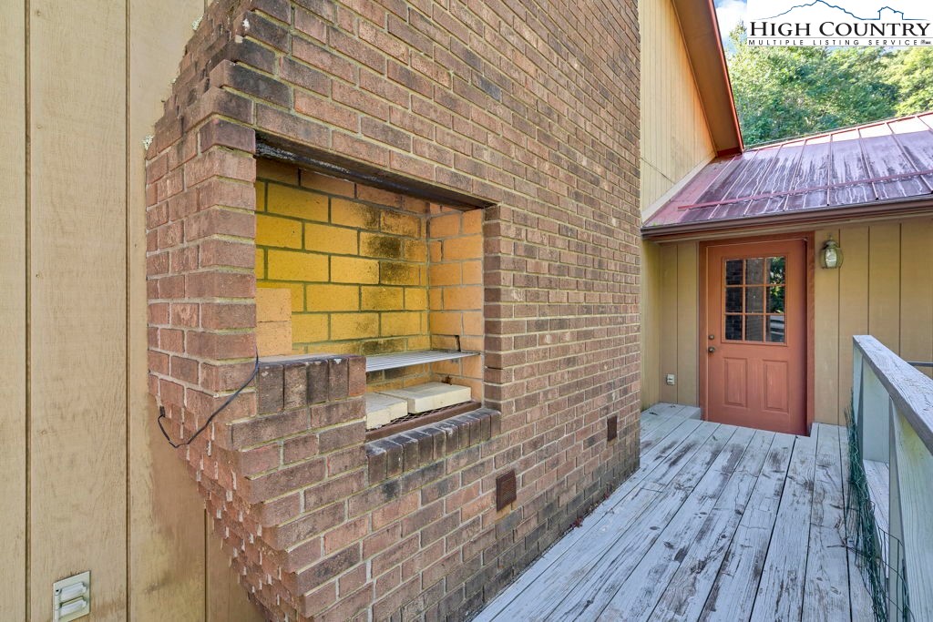 358 Devonwood Drive Boone, NC 28607 - Photo 50 of 50 a view of a wooden door and an outdoor space