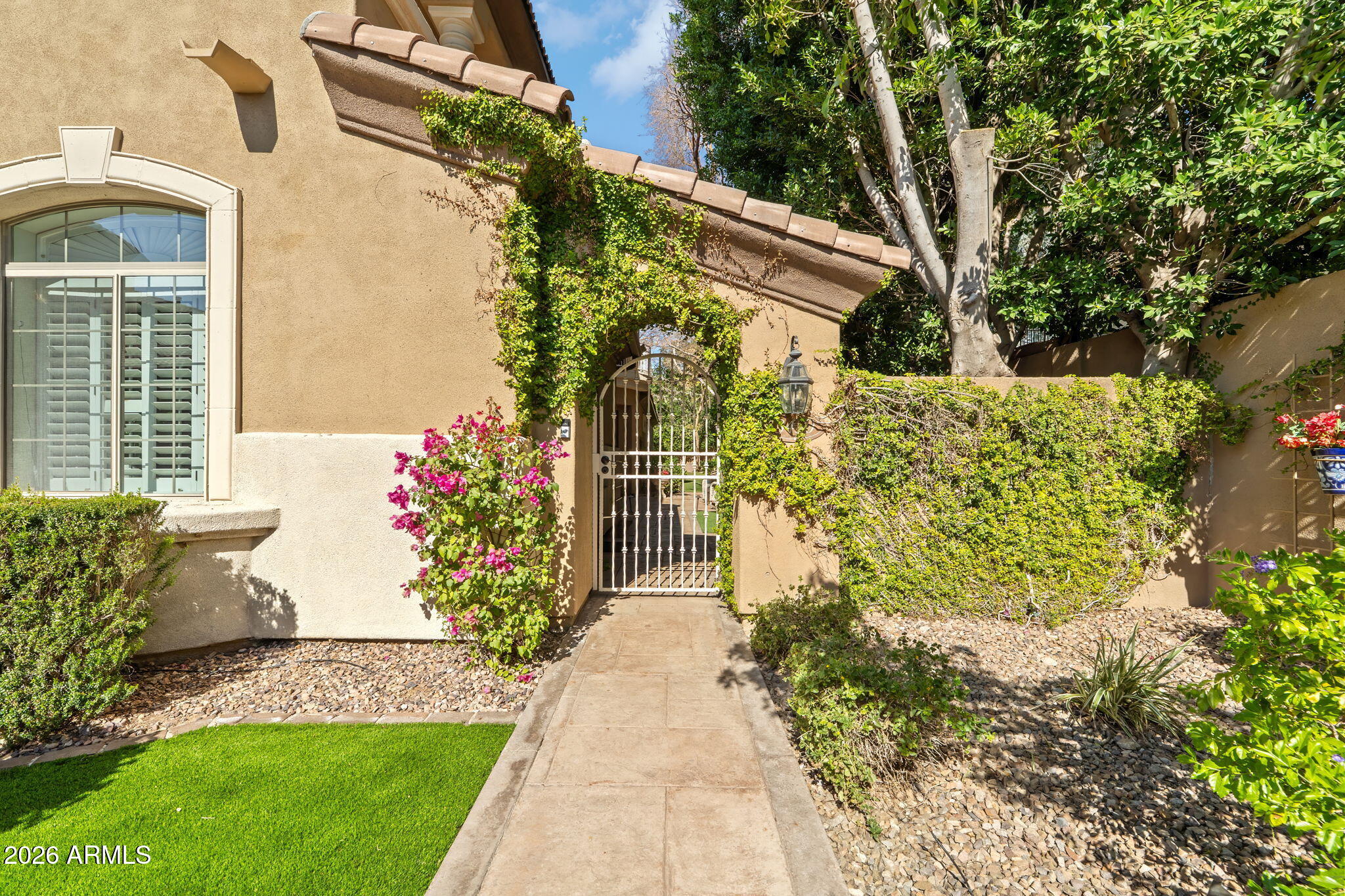 3450 East Pyrenees Pass Phoenix, AZ 85018 - Photo 4 of 55 Entrance to Courtyard