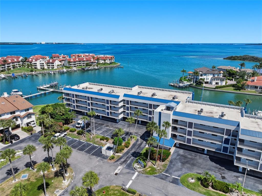 363 Pinellas Bayway South, Unit 29 Tierra Verde, FL 33715 - Photo 43 of 59 a balcony with outdoor seating and city view