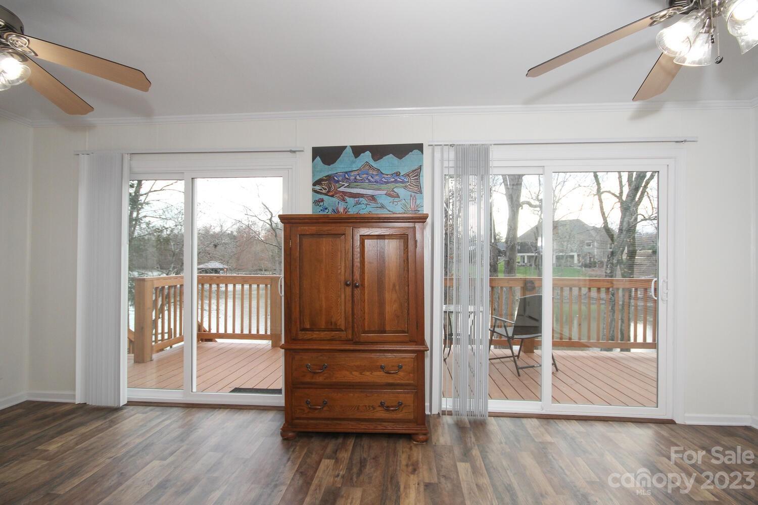 5615 Cypress Road Clover, SC 29710 - Photo 13 of 26 a view of empty room with wooden floor and fan