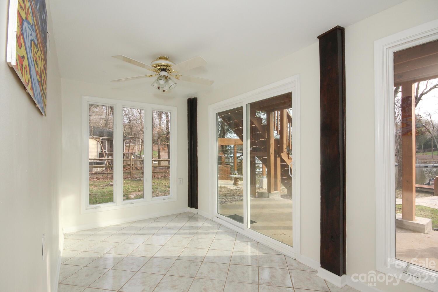 5615 Cypress Road Clover, SC 29710 - Photo 21 of 26 an empty room with windows and closet