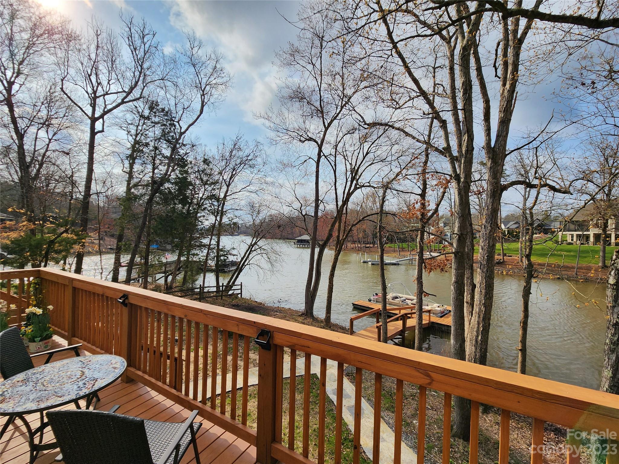 5615 Cypress Road Clover, SC 29710 - Photo 4 of 26 a view of a balcony with lake view and wooden fence