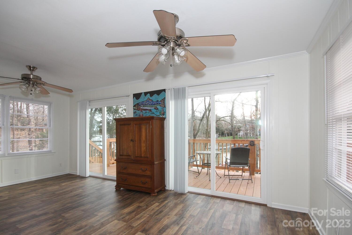5615 Cypress Road Clover, SC 29710 - Photo 9 of 26 a view of an empty room with wooden floor and a window