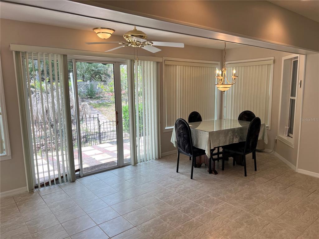 1995 East Newhaven Street Inverness, FL 34453 - Photo 24 of 48 a dining room with furniture and window
