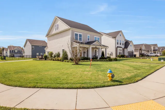a view of a house with a swimming pool