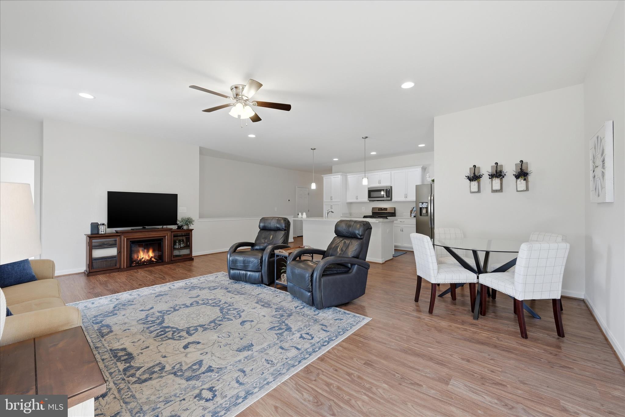 133 Patchwork Drive Stephenson, VA 22656 - Photo 11 of 63 a living room with furniture and a flat screen tv