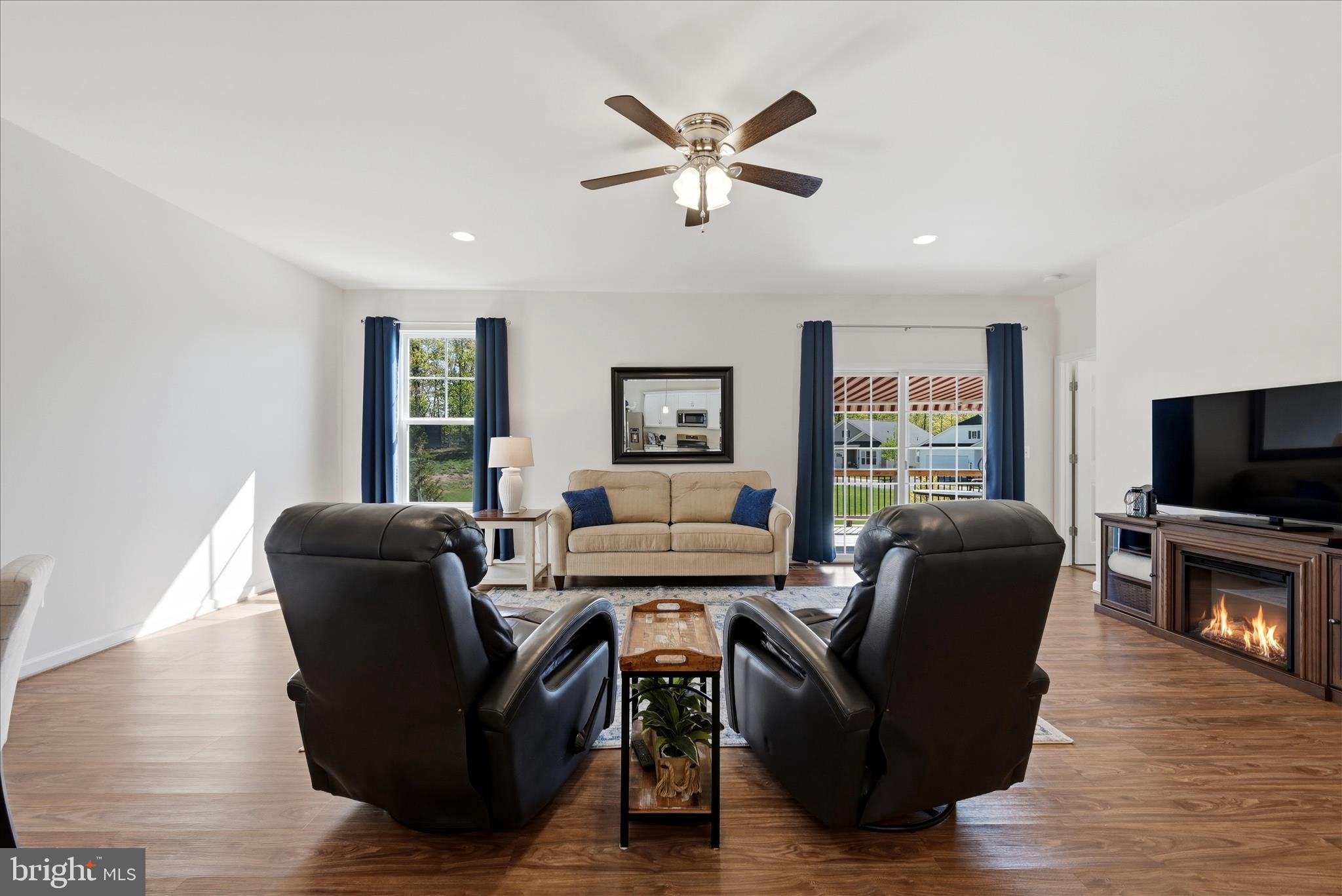 133 Patchwork Drive Stephenson, VA 22656 - Photo 12 of 63 a living room with furniture fireplace and a flat screen tv