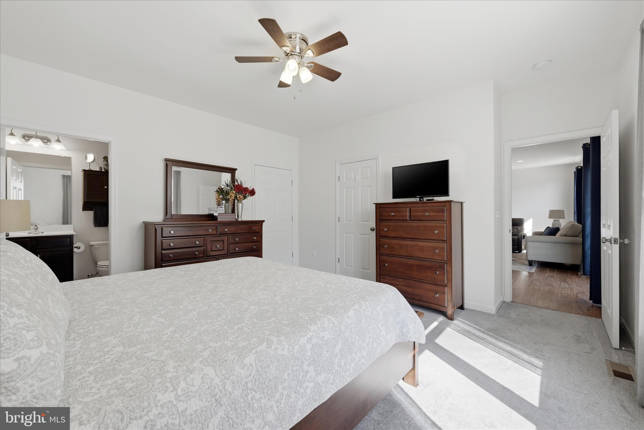 133 Patchwork Drive Stephenson, VA 22656 - Photo 15 of 63 a bedroom with a bed and a flat screen tv