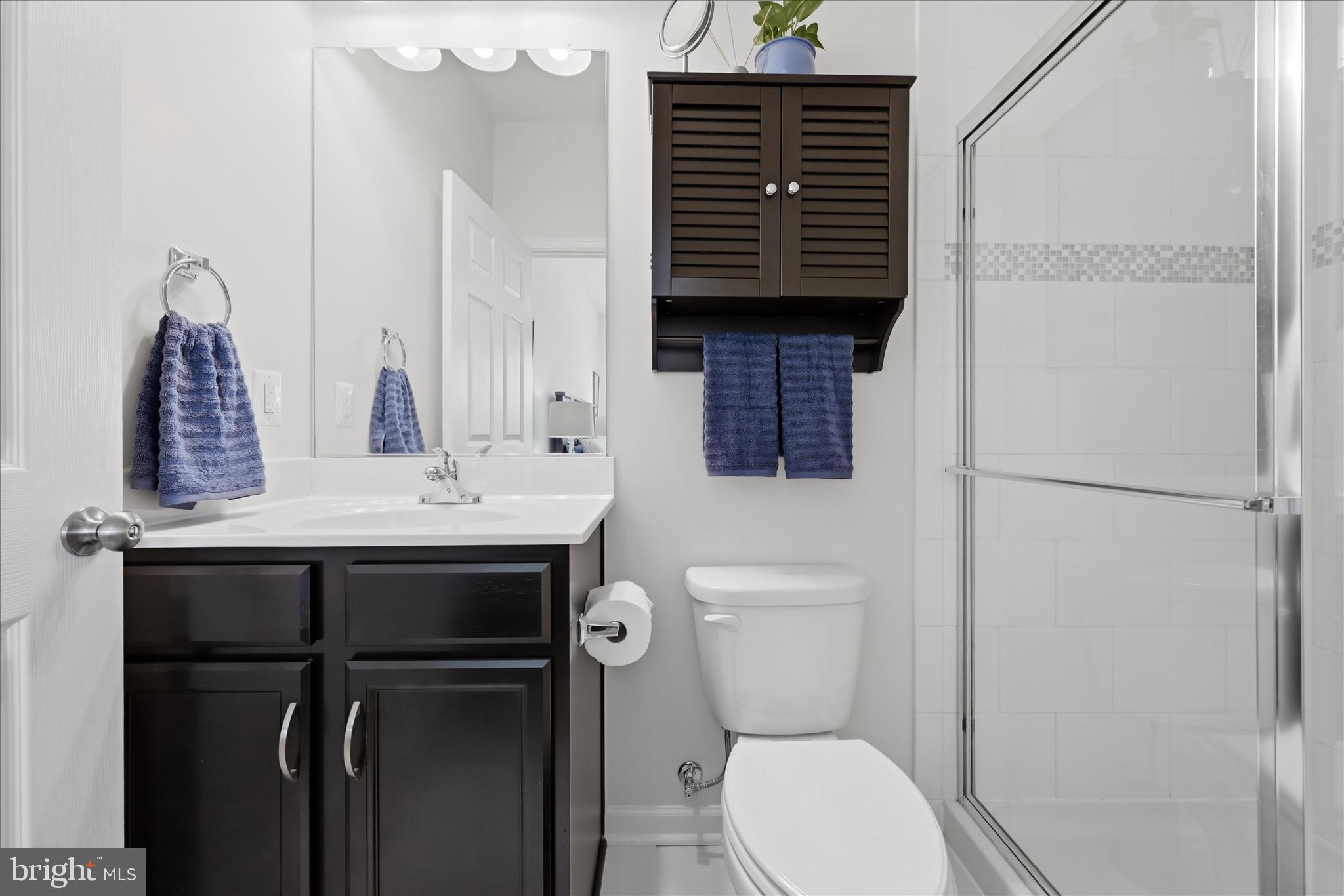 133 Patchwork Drive Stephenson, VA 22656 - Photo 16 of 63 a bathroom with a sink toilet and mirror