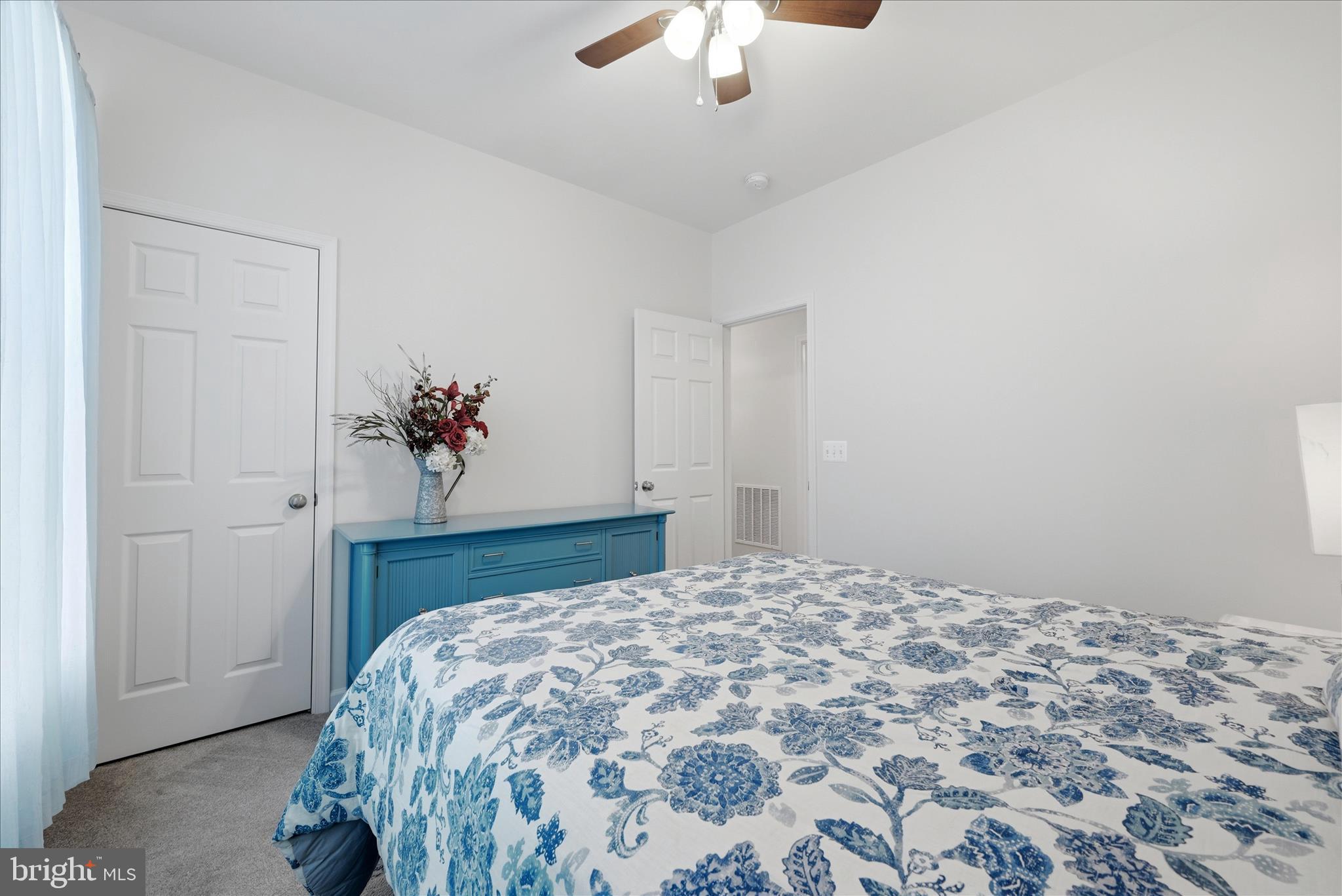 133 Patchwork Drive Stephenson, VA 22656 - Photo 18 of 63 a bedroom with a bed and a chandelier
