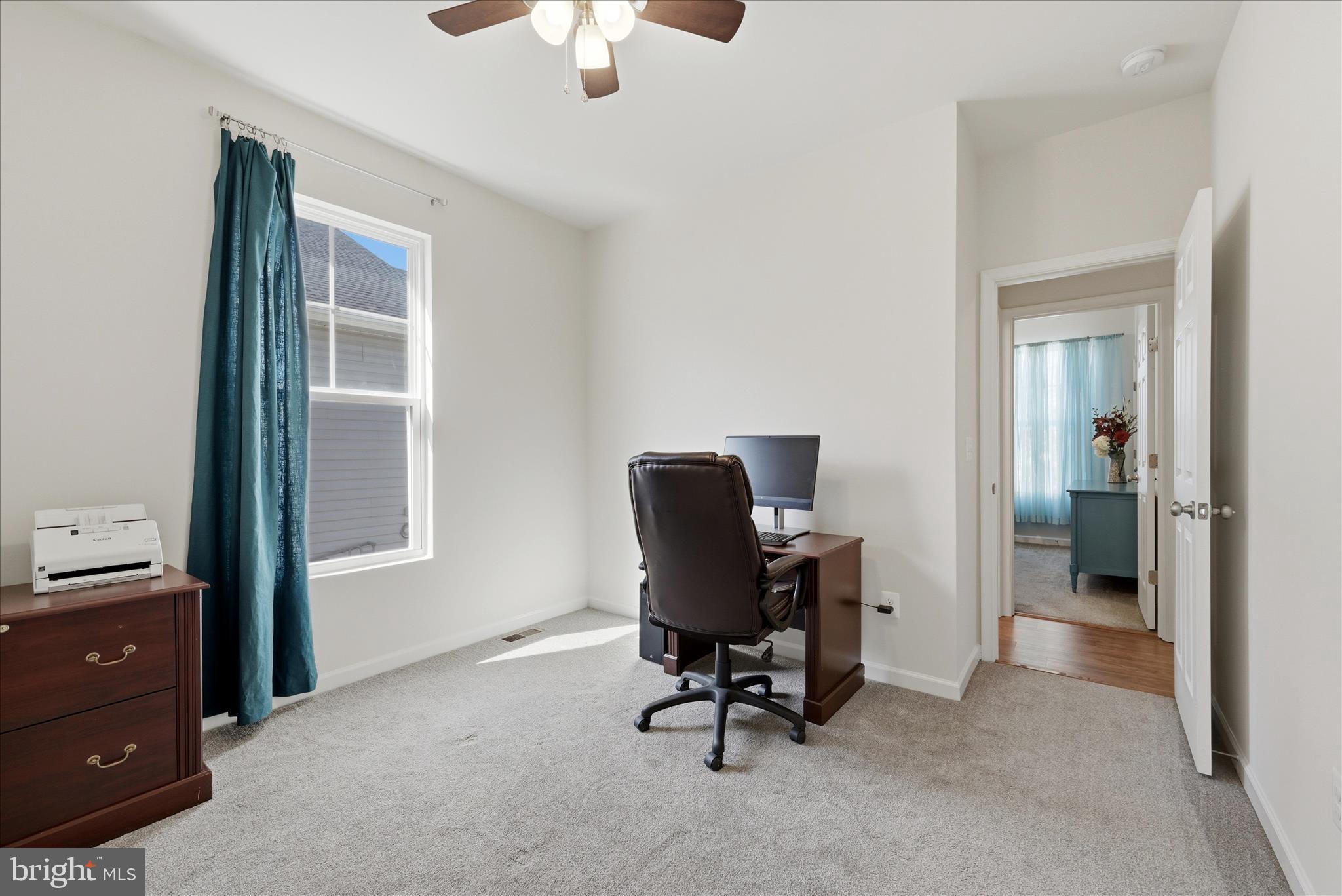 133 Patchwork Drive Stephenson, VA 22656 - Photo 21 of 63 a view of a workspace with furniture and a window