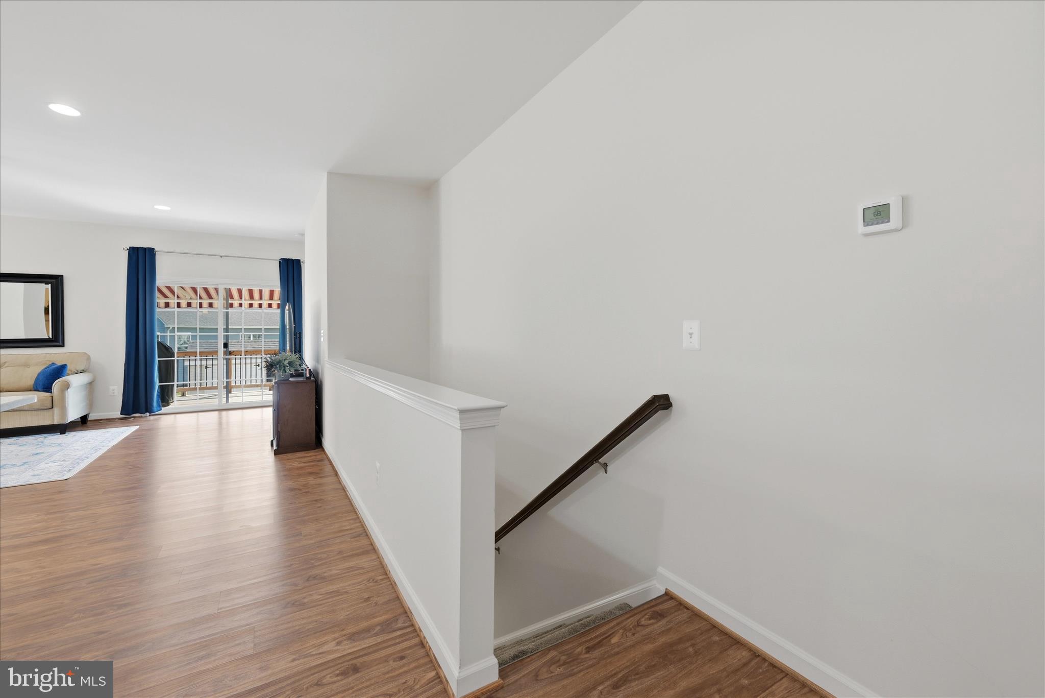 133 Patchwork Drive Stephenson, VA 22656 - Photo 23 of 63 a view of a hallway with wooden floor and staircase