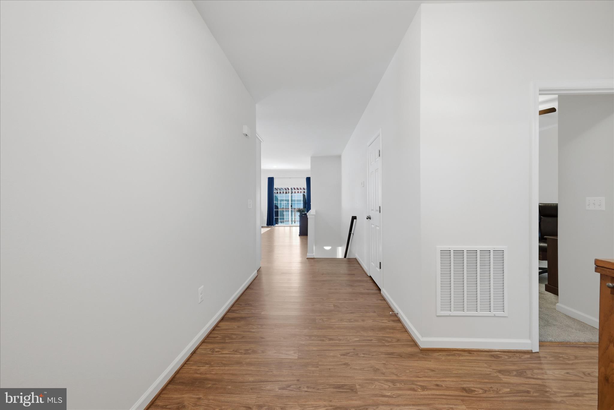 133 Patchwork Drive Stephenson, VA 22656 - Photo 4 of 63 a view of a hallway with wooden floor