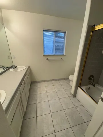 a view of a hallway with utility room