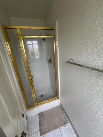 a view of a field with an trees