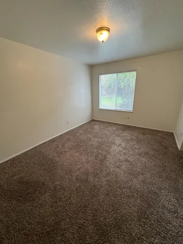 a view of small space with wooden floor