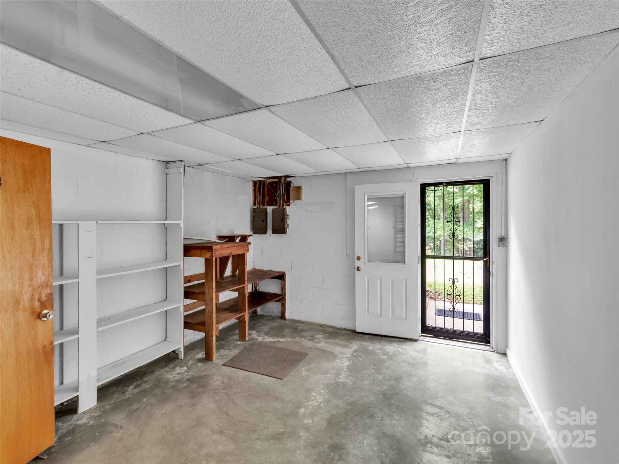 250 Reeves Cove Road Candler, NC 28715 - Photo 29 of 47 a view of an empty room with a window