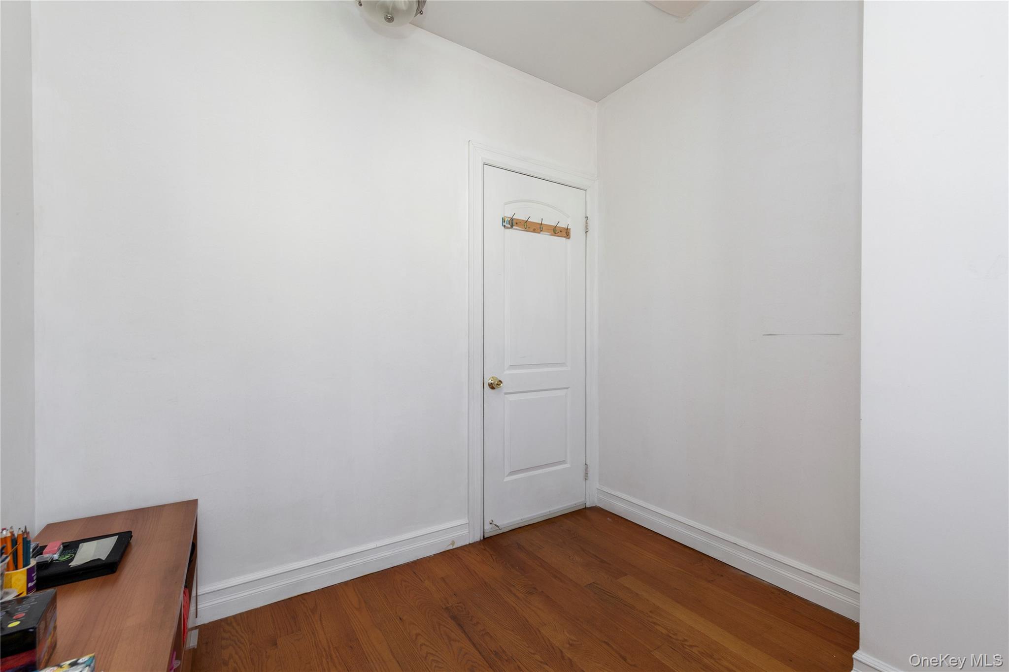10716 37th Avenue, Unit 3B Queens, NY 11368 - Photo 16 of 19 a view of an empty room
