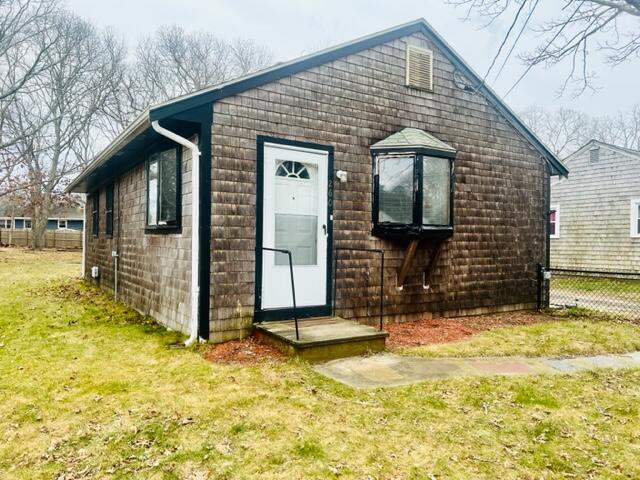 260 Hinckley Road Hyannis, MA 02601 - Photo 1 of 18 front view of a house with a yard