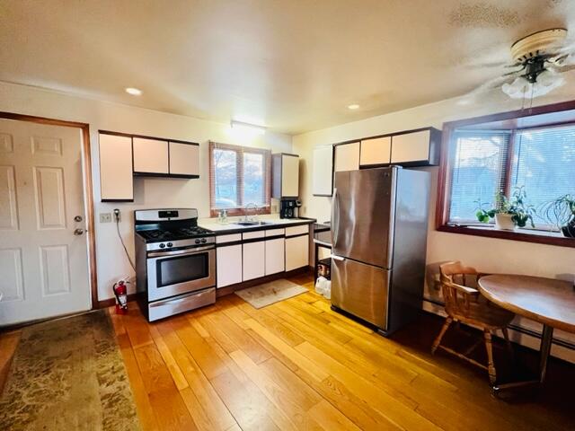 260 Hinckley Road Hyannis, MA 02601 - Photo 7 of 18 a kitchen with stainless steel appliances a refrigerator and a stove top oven