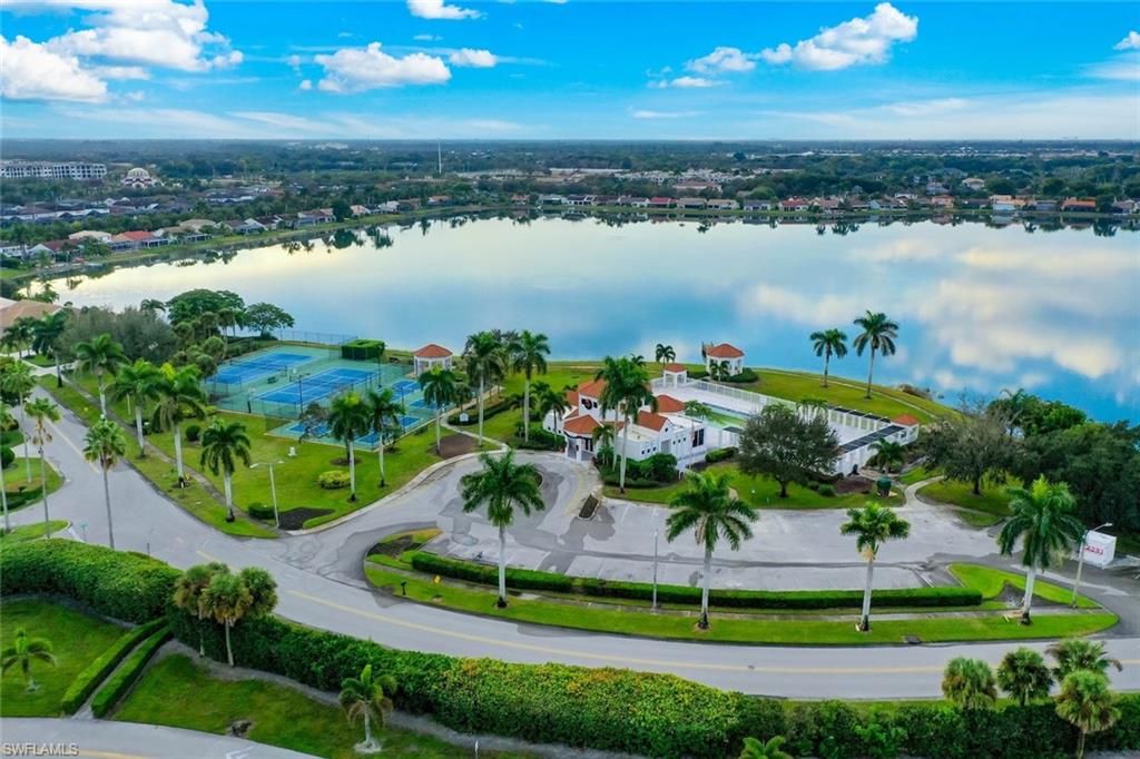 7761 Jewel Lane, Unit 103 Naples, FL 34109 - Photo 22 of 26 a view of a lake