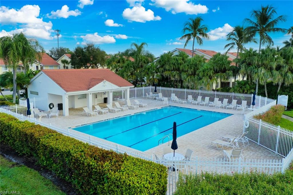 7761 Jewel Lane, Unit 103 Naples, FL 34109 - Photo 25 of 26 a view of house with outdoor space and swimming pool