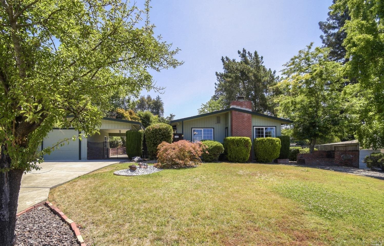 1540 St Francis Road Santa Rosa, CA 95409 - Photo 1 of 1 a view of a house with a yard
