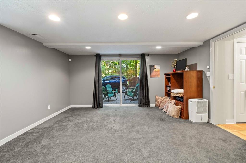 21 Oakglen Drive Oakmont, PA 15139 - Photo 21 of 50 an empty room with furniture and a large window